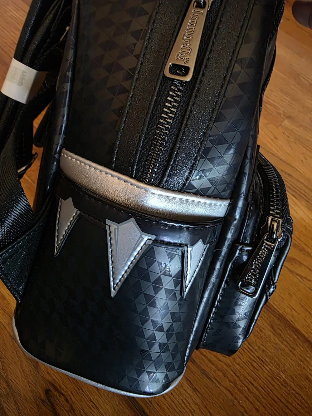 Black Panther Disneyland Spirit Jersey, Minnie ears, and Loungefly Backpack Bund